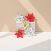 Red, gold, white and silver Christmas bow decorations, Christmas tree pendants, Christmas balls and garlands details Picture